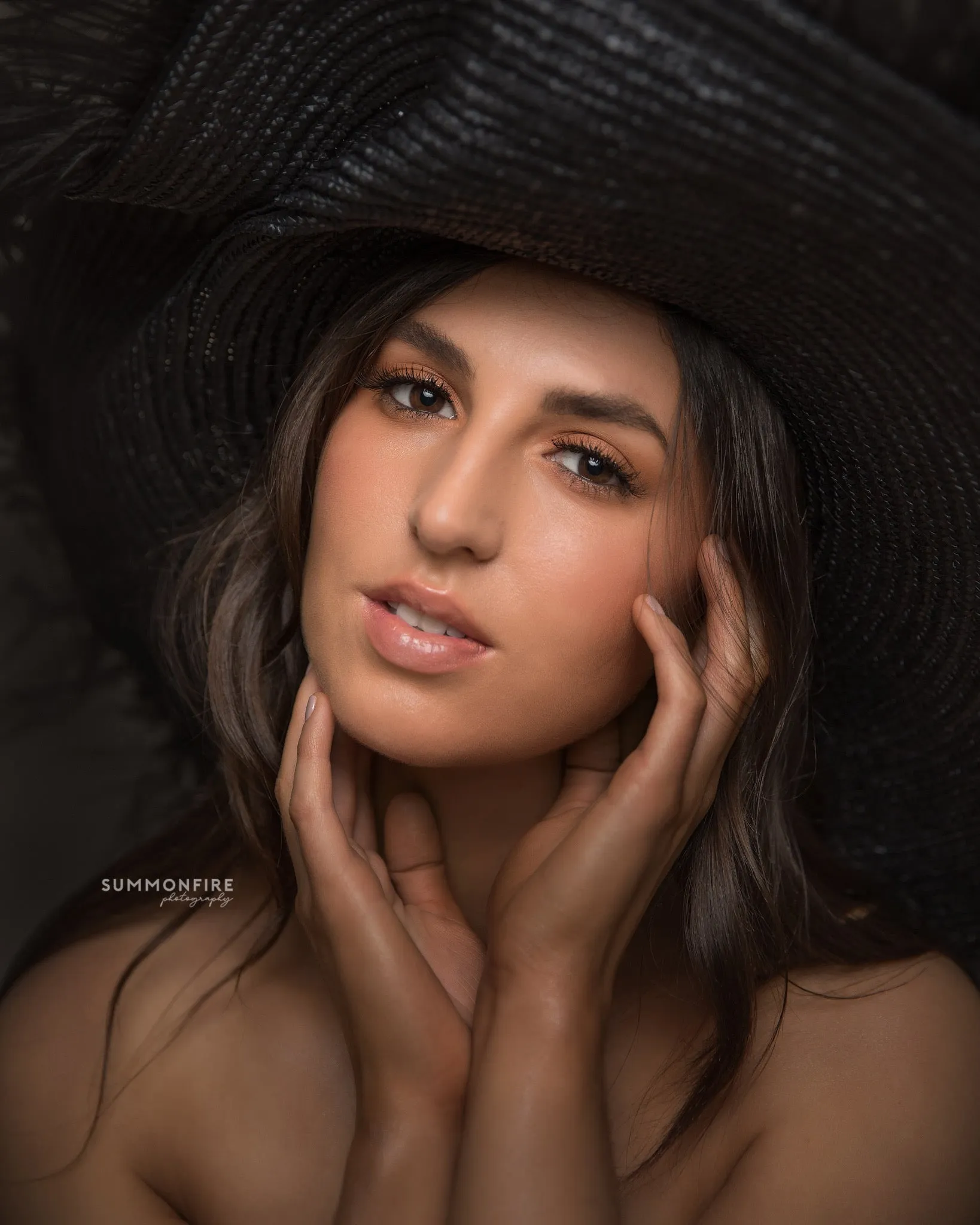 A _Anou  oversized Black Feather Hat