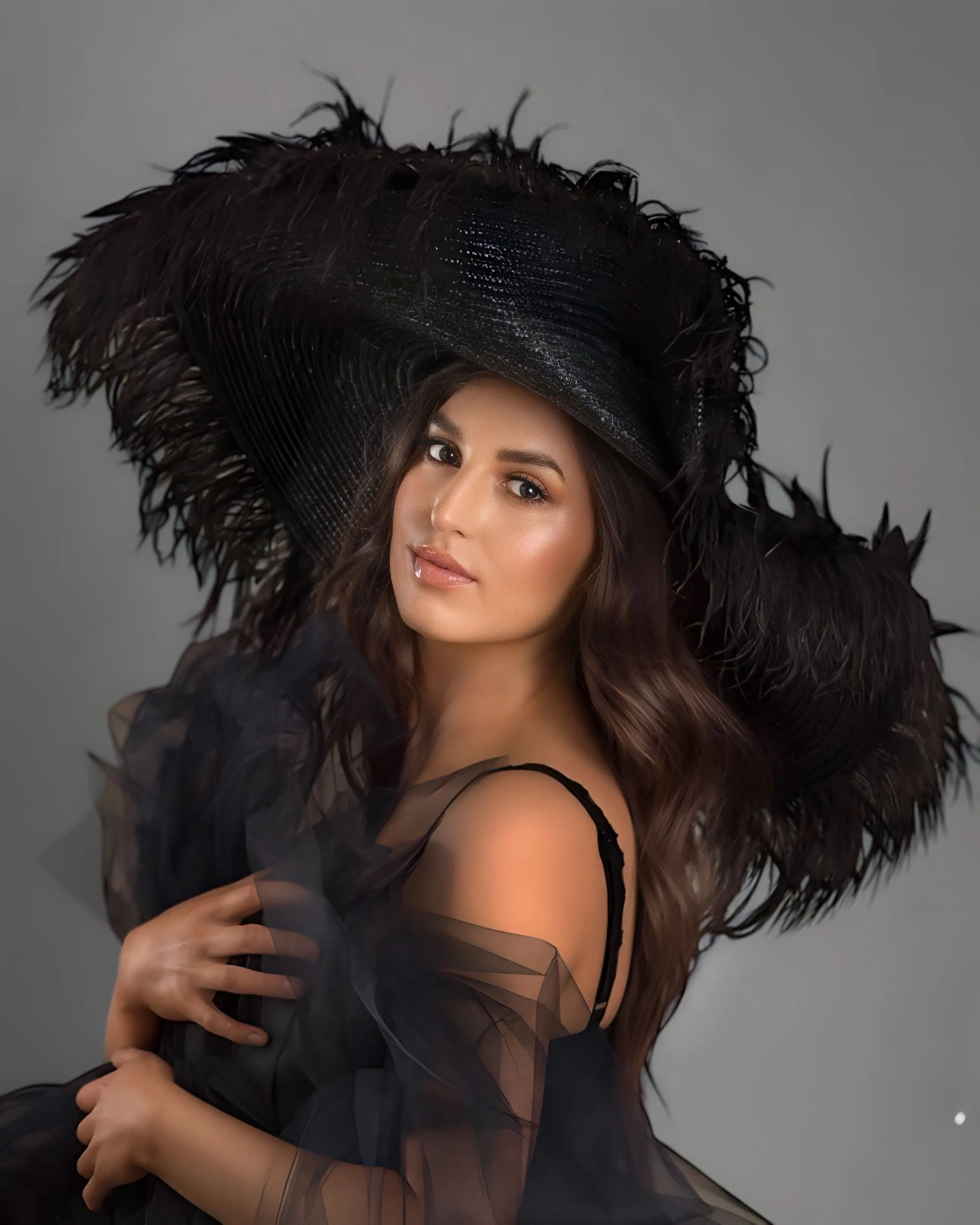 A _Anou  oversized Black Feather Hat